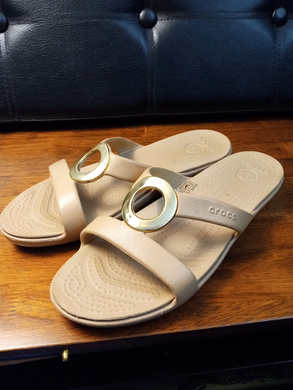 Crocs Women's Beige Slide Sandals with Gold Accent